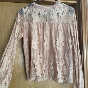 Sweet blush-colored blouse with beautiful lace detailing